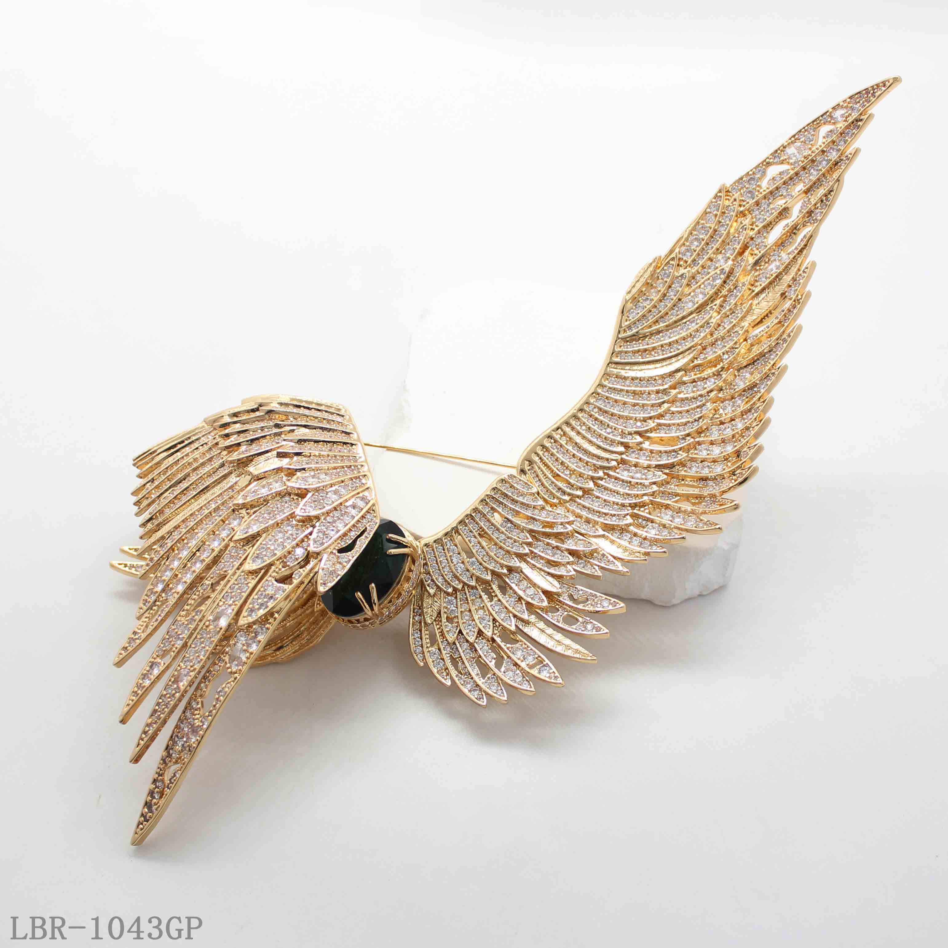 Custom Crystal Wing Brooch | Wholesale Jewelry Manufacturer  Premium gold-plated wing brooch from China jewelry factory. Custom design, bulk wholesale, fast lead time for global business clients.